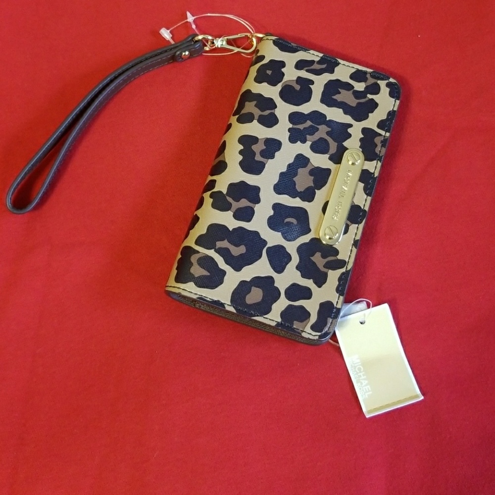 Michael Kors phone case wristlet. New